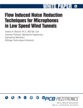 Flow Induced Noise Reduction Techniques for Microphones in Low Speed Wind Tunnels