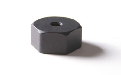 adhesive base, 0.75 hex x 0.375 thk, 10-32 tapped hole, aluminum with isolation hardcoat finish